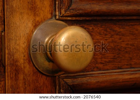Antique door and door knob showing its warm patina