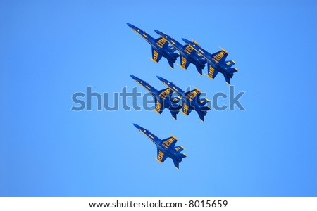 All six Navy FA-18 Blue Angels flying in a precision pattern