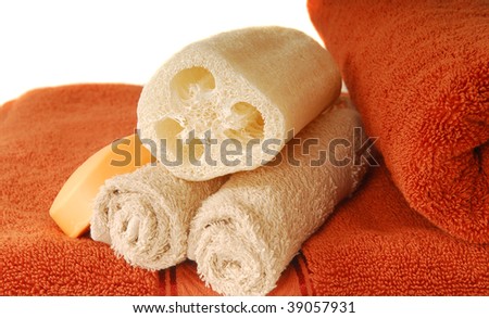 Luxurious soft cotton towels with soap and loofah