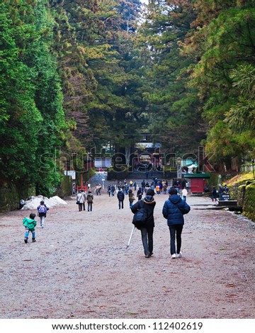 NIKKO, JAPAN - MARCH 24: People head toward Toshogu Shrine which is dedicated to the spirits of Ieyasu, consists of dozen Buddhist buildings in a beautiful forest on March 24, 2012 in Nikko, Japan.