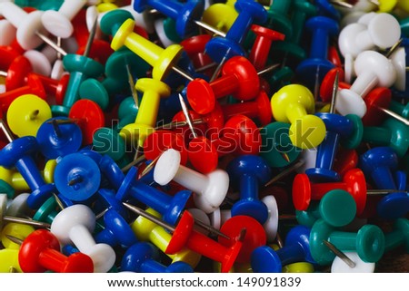 piles of plastic pins