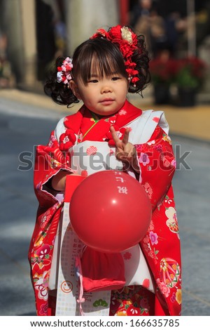 FUKUOKA, JAPAN - NOVEMBER 13: Shichi-go-san in Fukuoka, Japan on November 13, 2013. Traditional rite of passage and festival day in Japan for 3 and 7-year-old girls and 3 and 5-year-old boys.