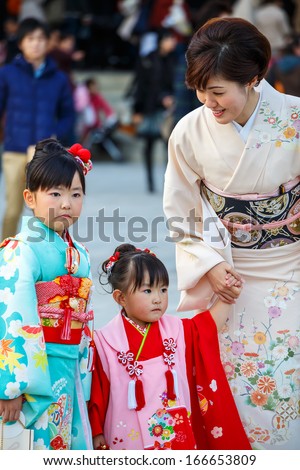 TOKYO, JAPAN - NOVEMBER 23: Shichi-go-san in Tokyo, Japan on November 23, 2013. Traditional rite of passage and festival day in Japan for 3 and 7-year-old girls and 3 and 5-year-old boys.