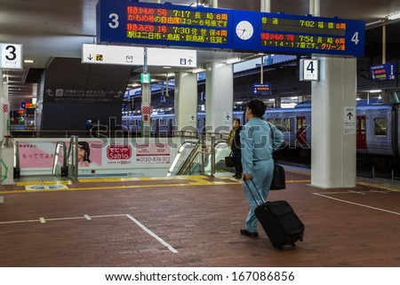 FUKUOKA, JAPAN - NOVEMBER 14: Hakata station in Fukuoka, Japan on November 14, 2013. Unidentified people travel to work early in the morning at Hakata station