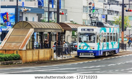 OKAYAMA, JAPAN - NOVEMBER 17: Okayama Street car in Okayama, Japan on November 17, 2013. Only cover a small area in central Okayama city. 1 day pass available for 400 Yen