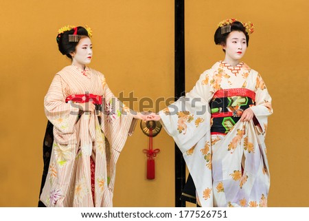 KYOTO, JAPAN - NOVEMBER 18: Kyomai Dance  in Kyoto, Japan on November 18, 2013. Unidentified Geisha performs Kyomai dance which adopted the elegance and of the imperial court manner