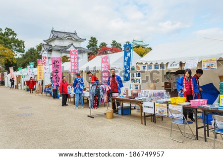NAGOYA, JAPAN - NOVEMBER 21: Japanese Fair in Nagoya, Japan on November 21, 2013. Japanese vendors are in front of Nagoya castle where\'s the venue of castle\'s autumn fair