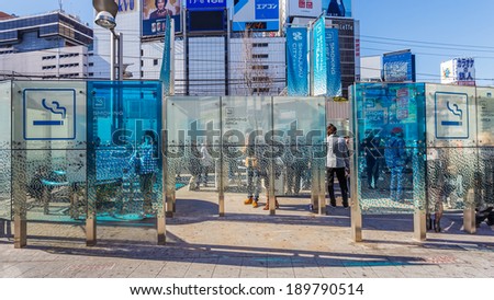 TOKYO, JAPAN - NOVEMBER 23: Smoking Area in Tokyo, Japan on November 23, 2013. In front of Shinjuku station, the area is prepared for the smoker for not disturbing nonsmoker