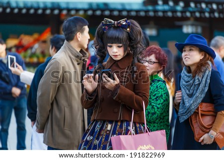 TOKYO, JAPAN - NOVEMBER 23: Cosplay in Tokyo, Japan on November 23, 2013. Unidentified Japanese woman dresses up a cosplay at Meiji-jingu shrine near Harajuku, the area where cosplay is very popular.