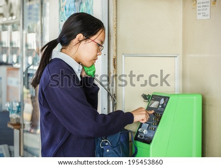KAMAKURA, JAPAN - NOVEMBER 24: Coin operated telephone in Kamakura, Japan on November 24, 2013. Coin operated public telephone still can be found in many train station in Japan