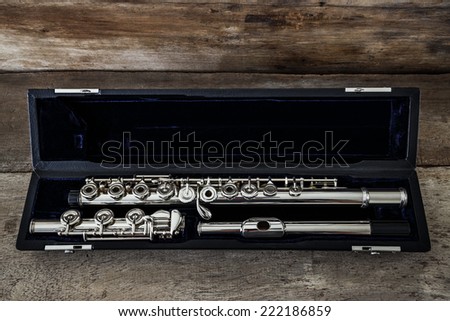 Modern Concert Flute on a Wood Table