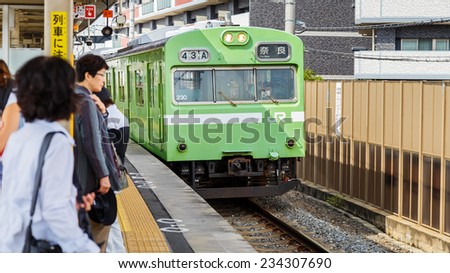 KYOTO, JAPAN - OCTOBER 21: JR Nara Line in Kyoto, Japan on October 21, 2014. A commuter rail line in the Osaka-Kobe-Kyoto metropolitan area, operated by the West Japan Railway Company (JR West).