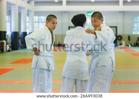 OSAKA, JAPAN - OCTOBER 25: Shudokan Hall in Osaka, Japan on October 25, 2014. Unidentified Japanese students attend the Judo class which is a traditional Matial art at Shudokan hall