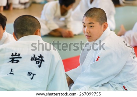 OSAKA, JAPAN - OCTOBER 25: Shudokan Hall in Osaka, Japan on October 25, 2014. Unidentified Japanese students attend the Judo class which is a traditional Matial art at Shudokan hall