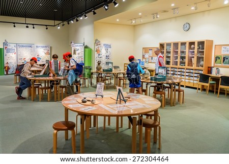 OSAKA, JAPAN - OCTOBER 27: Museum of History in Osaka, Japan on October 27, 2014. Unidentified Japanese students make a field trip to the Naniwa Archaeological Resource Centre