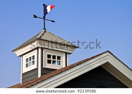 A Roof of a European House with French Metal Flag