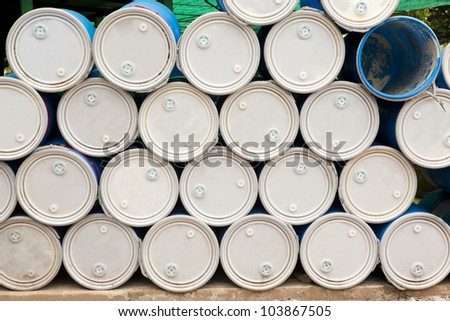 oil barrels or chemical drums stacked up for cargo