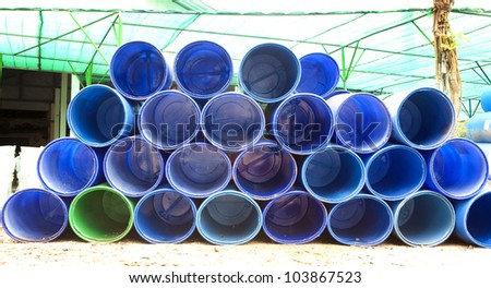 oil barrels or chemical drums stacked up for cargo