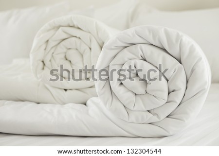 Duvet Roll. Down Filled Duvet Rolled Up Isolated On White Background