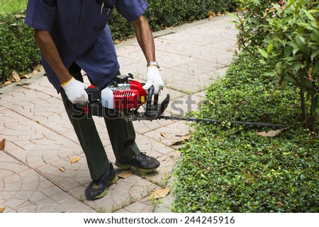 Workers were using electric mower for Gardening.
