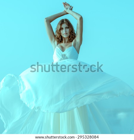 Girl in a flowing white dress
