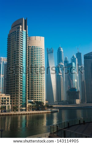 DUBAI, UAE - NOVEMBER 13: High rise buildings and streets nov 13. 2012  in Dubai, UAE. Dubai was the fastest developing city in the world between 2002 and 2008.