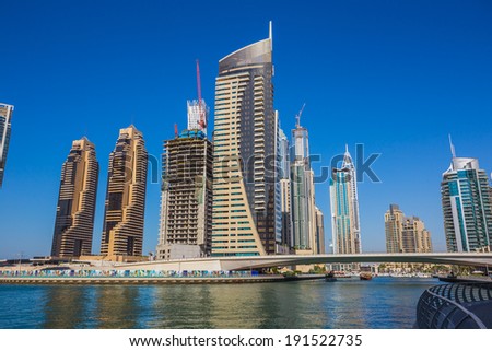 DUBAI, UAE - NOVEMBER 11: High rise buildings and streets nov 11. 2013 in Dubai, UAE. Dubai was the fastest developing city in the world between 2002 and 2008.