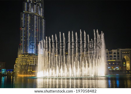 DUBAI, UAE - November 31: A record-setting fountain system set on Burj Khalifa Lake, it shoots water 150 m into the air, at November 31, 2013 in Dubai, United Arab Emirate