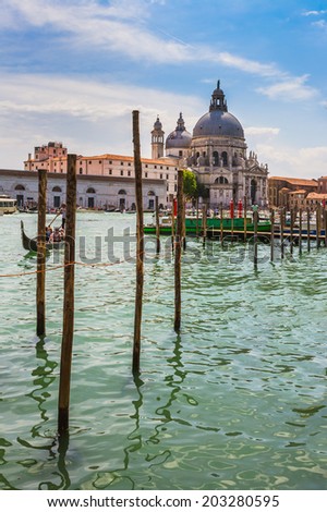 VENICE-JUNE, 26, 2014: Grand Canal and Basilica Santa Maria della Salute, Venice, Italy and sunny day