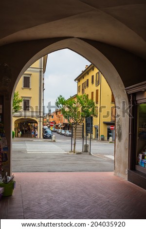 ITALY - JUNE 28, 2014: Typical Italian street in a small provincial town of Tuscan, Italy, Europe