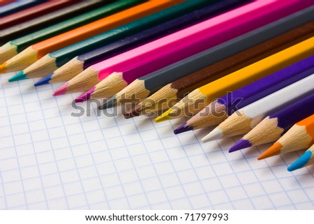 Pencils at the cellular background