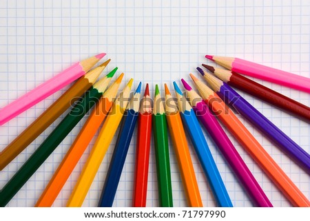 Pencils at the cellular background