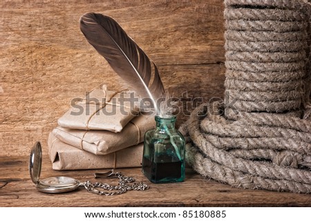 bottle of wine wrapped in a rope against the old wooden boards