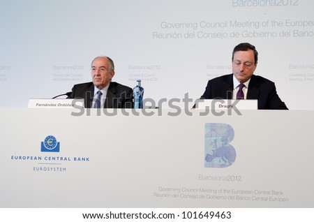 BARCELONA, SPAIN - MAY 03: ECB President Mario Draghi and Miguel FernÃ?Â¡ndez OrdÃ?Â³Ã?Â±ez at the press conference following the Governing Council meeting of the ECB on May 3rd 2012 in Barcelona, Spain