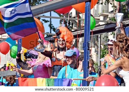 BARCELONA, SPAIN - JUNE 26: PRIDE BARCELONA Participants dance during the colorful and bright gay and lesbian pride parade on June 26, 2011 in the center of Barcelona, Spain.