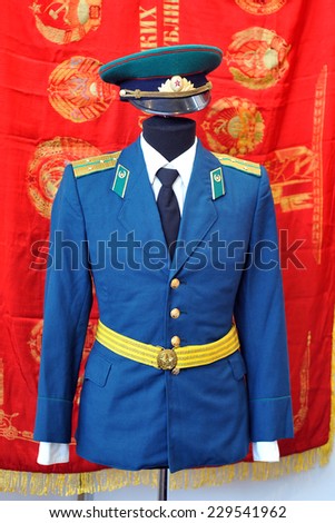MILAN, ITALY - NOV 1: Russian uniform, Exhibitor sitting in his stand at Militalia, exhibition dedicated to militaria collectors and military associations on November 1, 2014 in Milan.