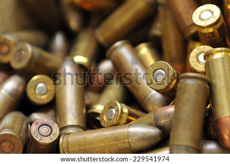 MILAN, ITALY - NOV 1: Bullets, Exhibitor sitting in his stand at Militalia, exhibition dedicated to militaria collectors and military associations on November 1, 2014 in Milan.