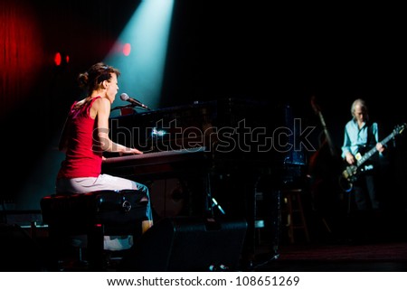 SEATTLE - JULY 25:  Rock singer, songwriter and pianist Fiona Apple performs on stage at the Paramount Theater in Seattle on July 25, 2012.