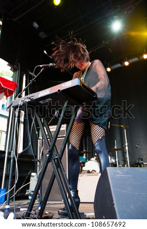 SEATTLE - JULY 22:  Singer Sarah Barthel of Indie Pop rock band Phantogram performs on stage during the Capitol Hill Block Party in Seattle on July 22, 2012.