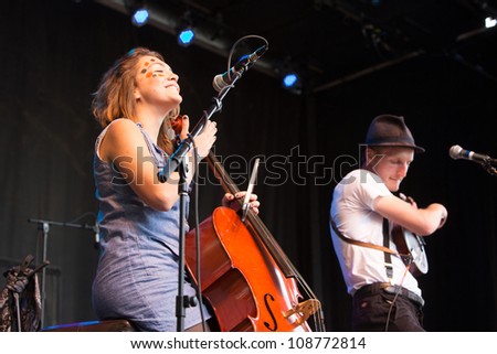 SEATTLE - JULY 22:  Neyla Pekarek of Denver folk band the Lumineers plays the cello on stage during the Capitol Hill Block Party in Seattle on July 22, 2012