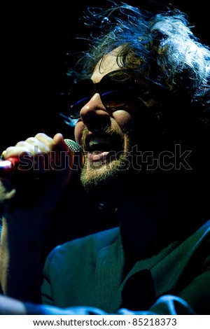 SEATTLE - SEPT. 4:  Singer Kevin Drew of Canadian indie rock band Broken Social Scene performs on stage during the Bumbershoot music festival in Seattle on September 4, 2011.