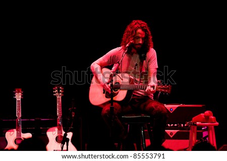 SEATTLE - MAY 1:Solo rock musician and lead singer of heavy metal band Soundgarden Chris Cornell plays acoustic guitar and sings on stage at the Moore Theater in Seattle on May 1, 2011.
