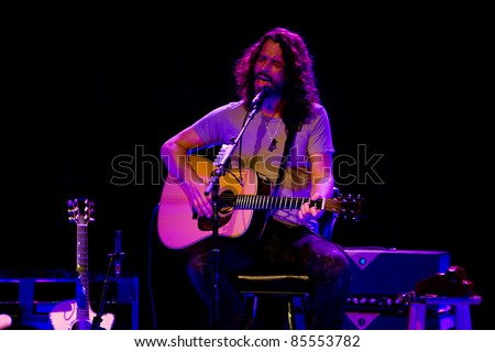 SEATTLE - MAY 1: Solo rock musician and lead singer of heavy metal band Soundgarden Chris Cornell plays acoustic guitar and sings on stage at the Moore Theater in Seattle on May 1, 2011.