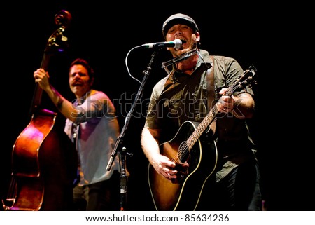 SEATTLE - JUNE 27:  Singer, Songwriter and Guitarist Chuck Ragan performs on stage at the Paramount Theater in Seattle, WA on June 27, 2011.