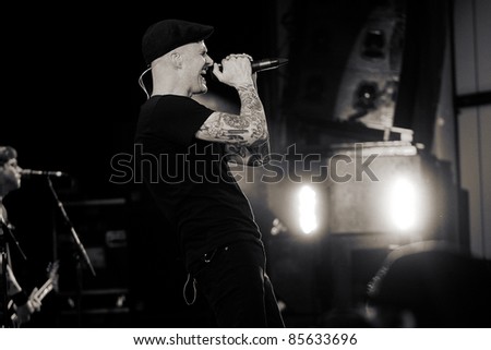 SEATTLE - JUNE 27:  Al Barr of the American Punk Rock Band the Dropkick Murphys performs on stage at the Paramount Theater in Seattle, WA on June 27, 2011