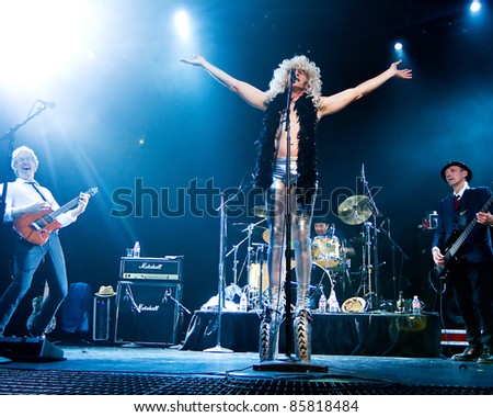 SEATTLE - JULY 1:  Lead singer Fee Waybill of rock band the Tubes performs on stage at the Triple Door Theater in Seattle on July 1, 2011.