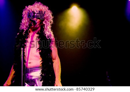 SEATTLE - JULY 1:  Singer Fee Waybill dressed in drag as his infamous character Quay Lewd of the rock band the Tubes performs on stage at the Triple Door Theater in Seattle, WA on July 1, 2011.