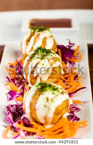Deep fried fish balls at an Asian cuisine restaurant.
