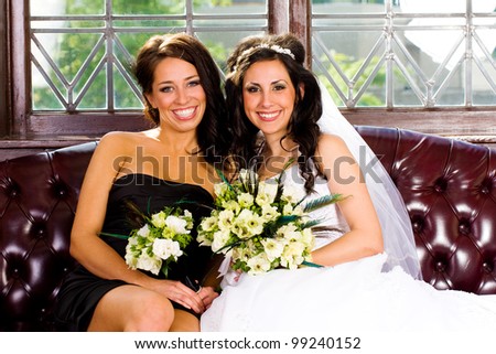 Beautiful Bride with her pretty Bridesmaid