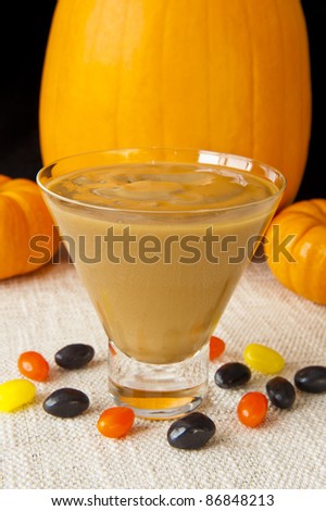 Dish of Butterscotch pudding with jellybeans and pumpkins